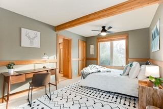 Bedroom with queen bed and attached bath