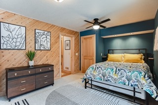 Downstairs bedroom with attached bath and sauna